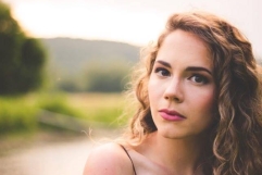 Catholic singer says her songs seek to open people\'s hearts to God, but she doesn\'t want \'Christian\' label