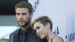 Miley Cyrus trying to be more conservative offstage for Liam Hemsworth?