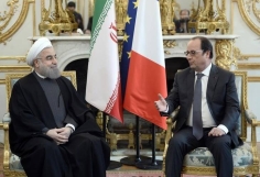 France: Iran clinches business deals worth billions as protesters march 