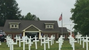 Removed memorial crosses for fallen soldiers in Georgia put back after public outcry
