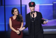Justin Bieber\'s mom prays to Holy Spirit to enlighten her son as video appears to show him fighting during NBA Finals