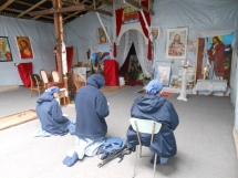 Catholic priest finds empty warehouses and donations drying up at Calais camp