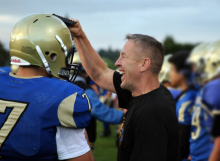 High school football coach suing Washington school district after being fired for praying at games