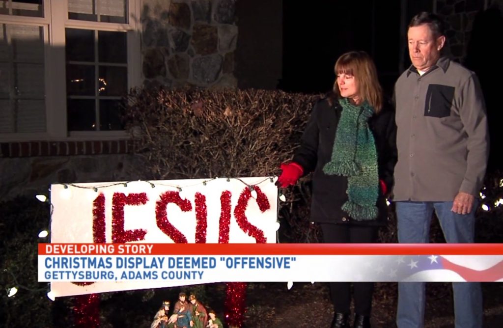 Christian couple refuse to take down 'offensive' Jesus sign in front of ...