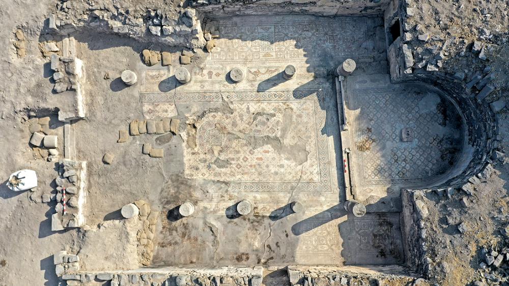 Archaeologists uncover mosaic showing five loaves and two fish near Sea ...